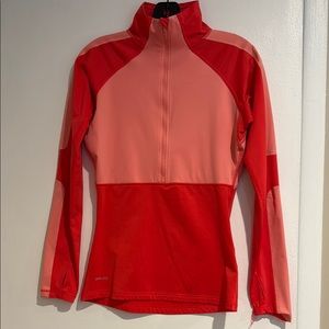 Nike Orange Jersey with High Collar and Athletic Design